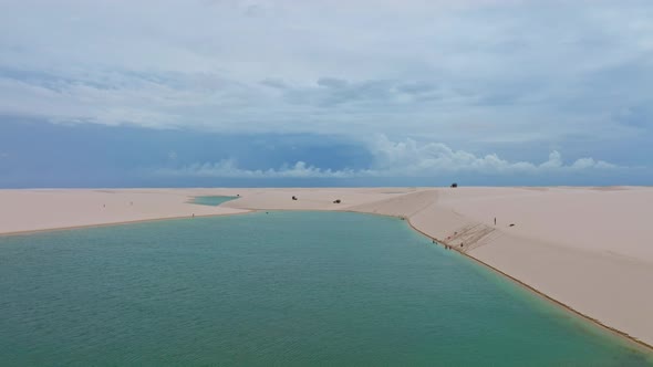 Drone Makes Orbit In A Blue Lagoon, Clear Sand, Paradise In Brazil