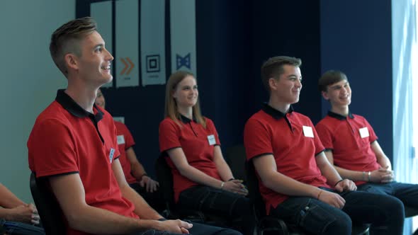 Young, motivated trainees in uniform at continuing education lectures