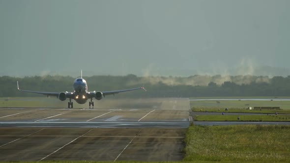 Early Morning Commercial Airplane Takeoff alt