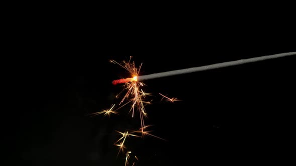 Sparkler on black background. Christmas or birthday backdrop. Close up. HD