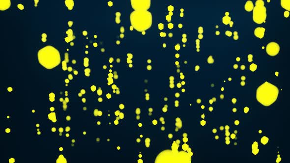 Abstract background animation of flying and flickering gold yellow particles light bokeh