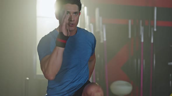 Caucasian young athlete male practice workout, cardio intensive exercise doing high knees. alt