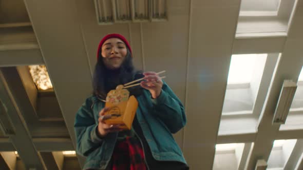 Girl Eating Asian Food and Dancing