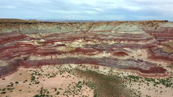 Bentonite Hills In Capitol Reef Wilderness At Daytime - aerial drone shot alt