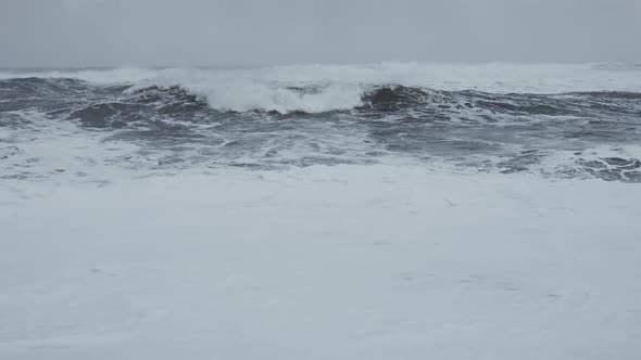Rough White Sea Coming Into Black Sand Beach alt