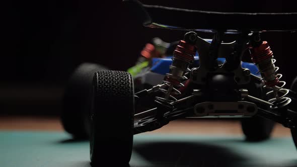 Closeup Radio Control Model Buggy Car on Cutting Mat Rear View
