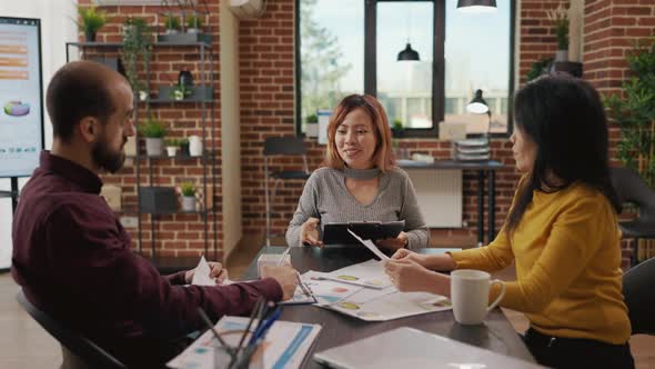 Diverse Team of Workers Applauding Successful Woman alt