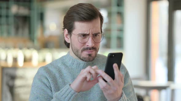 Portrait Young Man Loss Smartphone alt