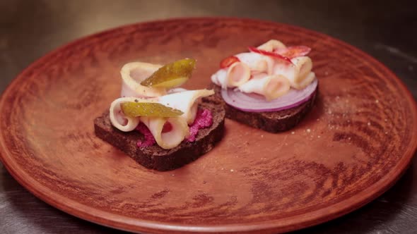 Serving Appetizers In The Form Of Sandwiches With Lard alt