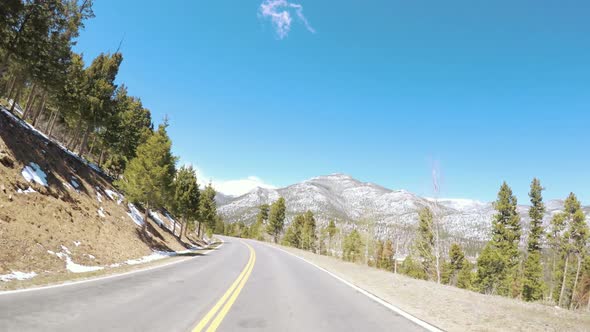 POV point of view -Driving through Rocky Mountain National Park in the Spring. alt