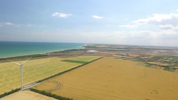 Panorama of Beautiful Landscape with Wind Generators in the Coastal Strip, Aerial Survey alt