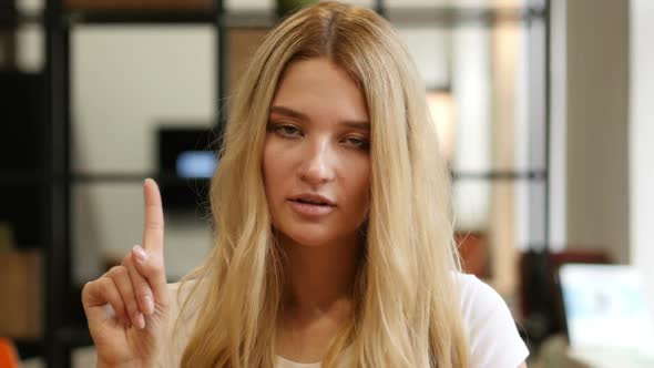 No, Not allowing Gesture by Waving Finger By Young Girl alt