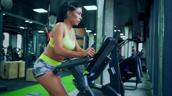 Fitness Woman Doing Cardio in Gym. alt