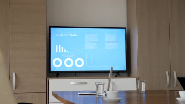 Empty Business Meeting Room with Big Screen TV alt