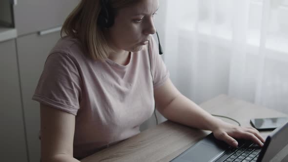 Blonde Girl Working Remotely