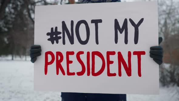 Single picket. Not my president. Protest against the newly elected president. alt