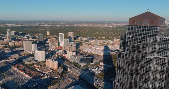 4k aerial shot of The Williams Tower in the Galleria Mall area in Houston, Texas alt