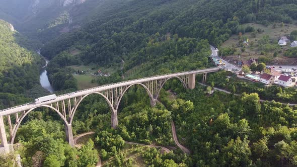 Aerial View of Long Iron Bridge Over a Mountain Gorge
