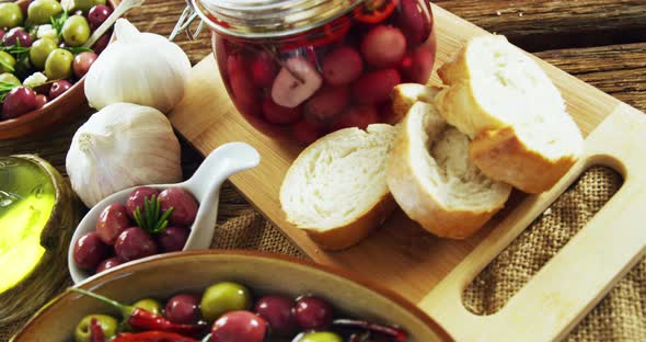 Ingredients pickled olives, olive oil, garlic and bread alt