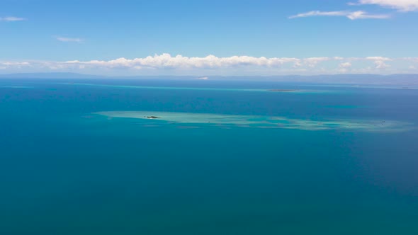 Blue Sea and Tropical Islands alt