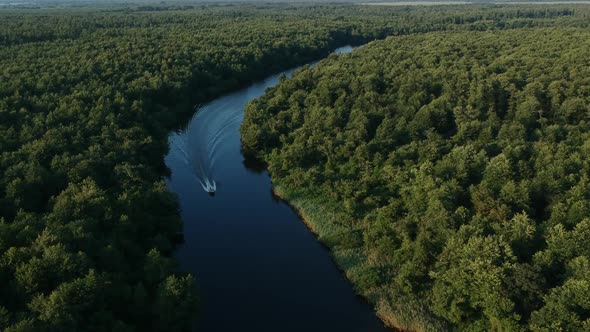 Motor boat in the river - Paliastomi lake in country Georgia alt