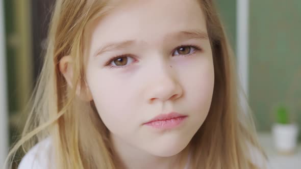 Portrait of a Sad Little Sweet Girl alt