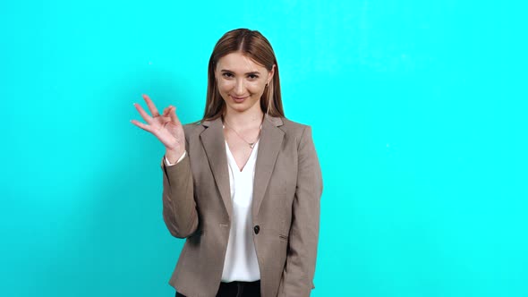 Portrait of an Adult Woman with Long Brown Hair, Keeping Her Mouth Shut alt