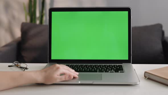 Woman Hands of Freelancer Working With Mockup Chroma Key Green Screen Laptop Using Trackpad
