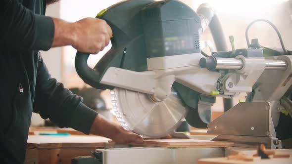 Carpentry Working - Cutting the Plywood Using Circular Saw alt