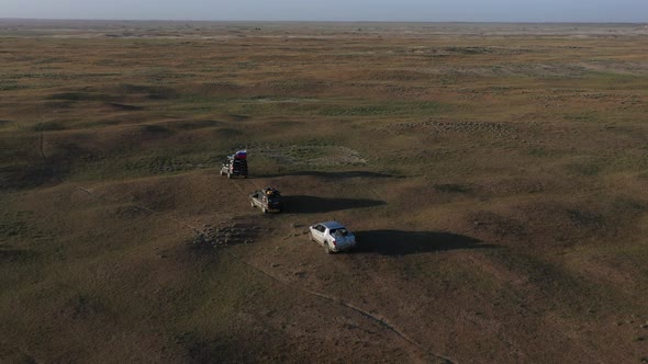 Desert Safari Offroading Group of Car 4X4 Vehicle Rides on Desert Dune Barkhan alt