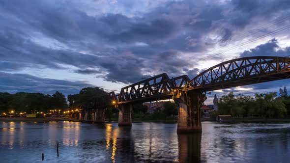 River Kwai Bridge, and Death Railway, Kanchanaburi, Thailand; day to night, tilt down - Time Lapse