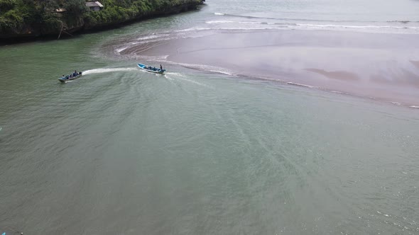 Aerial view of traditional boats in lagoon beach in Indonesia alt
