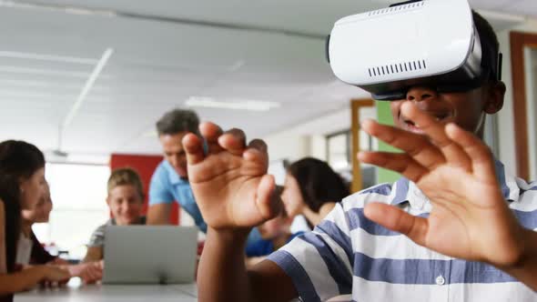 Schoolboy using virtual reality headset 4k alt