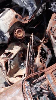 Vertical Video of Wardestroyed Cars in Ukraine alt