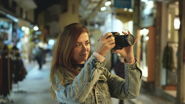 Traveling Lady Photographer Takes Pictures of Dusk Athens Streets