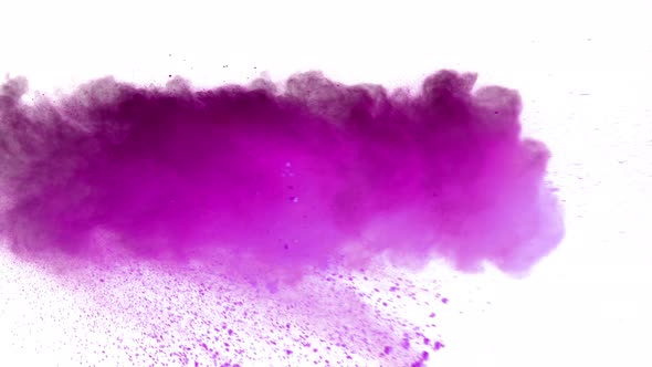 Super Slow Motion Shot of Purple Powder Explosion Isolated on White Background at 1000Fps alt