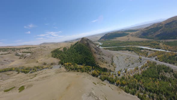 Aerial FPV Sport Drone View Natural Mountain Ridge Covered By Forest Trees alt