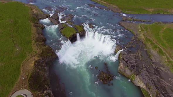 Drone Aerial Footage of the Godafoss Waterfall in North Iceland alt