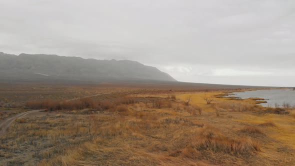 Drone Shot of River and Mountains in Kazakhstan alt