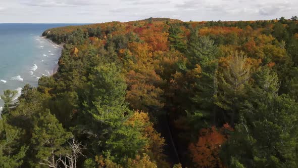 Fall colors in northern Michigan. Drone footage of fall colors and Lake Michigan. alt