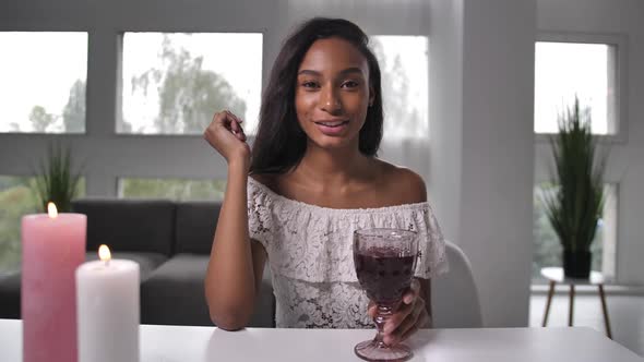 Joyful Mixed Race Woman Dating Using Video Chat alt