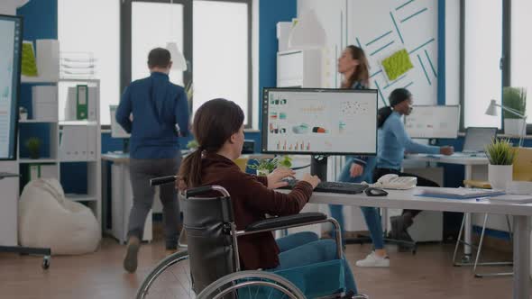Disabled Immobilized Invalid Manager Woman Working in Business Office alt