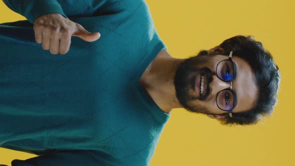 Young Man Showing Thumbs Up alt