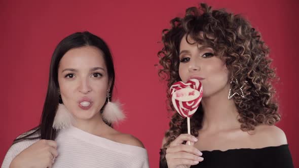 Cool Sexy Girls Blowing Gum and Licking Lollipop alt