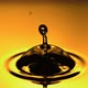 Drop Of Fuel Oil Dripping And Creating Bubble On The Yellow Surface - VideoHive Item for Sale