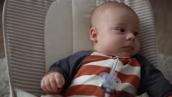 Look of Baby in Camera Infant Childhood Parental Love alt