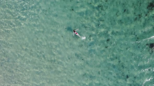 Woman snorkelling, Saint-Gilles, Reunion beach in the seaside resort of Saint-Gilles les Bains