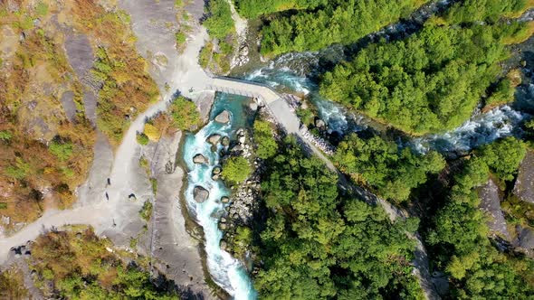 Beautiful hiking path or trekking path in the forest surrounded by trees alt