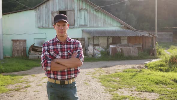 A Sincere Smiling Farmer Rejoices at the Beginning of a New Day