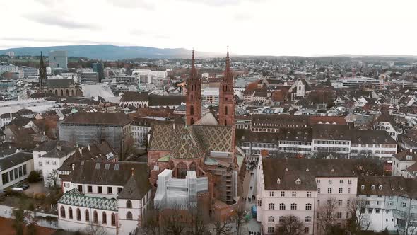 Basel Minster (Munster), Switzerland , Reformed Protestant church. Aerial cityscape pullback alt